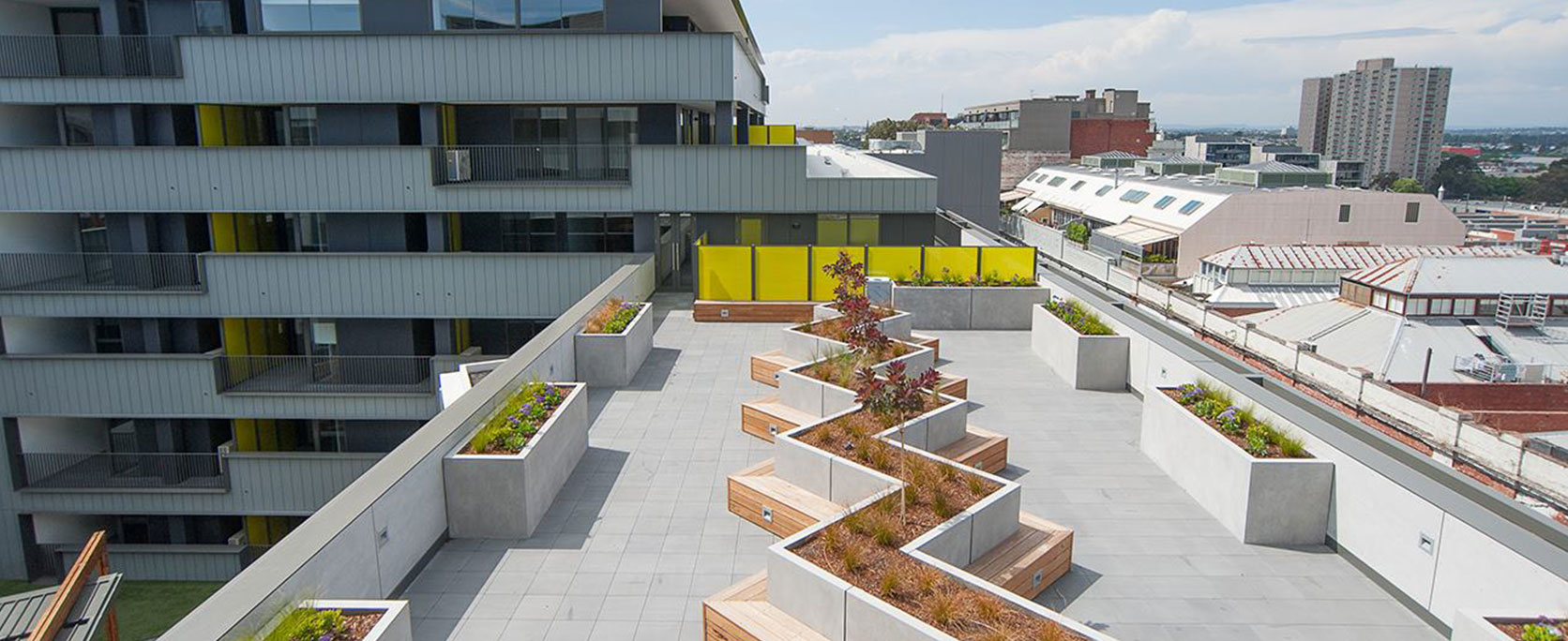 Lightweight custom concrete rooftop planter boxes