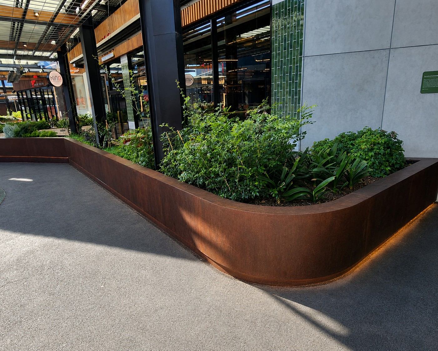 Custom curved planter boxes in Watergardens
