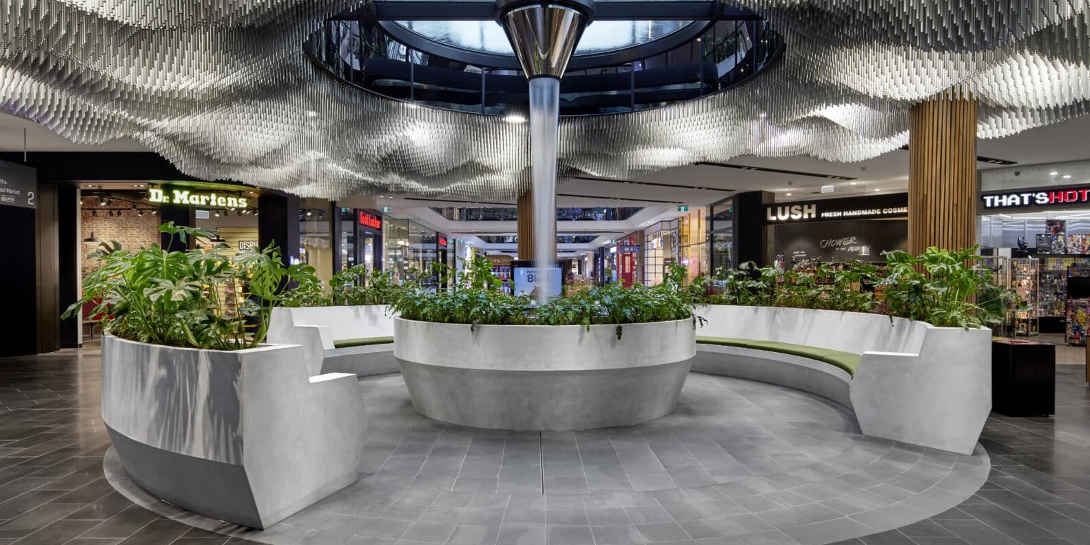 custom water feature and seating in highpoint by h2o designs Custom LICOM76 & Stainless steel Indoor water feature with integrated seating and planters at Highpoint shopping centre, by H2O Designs, Melbourne