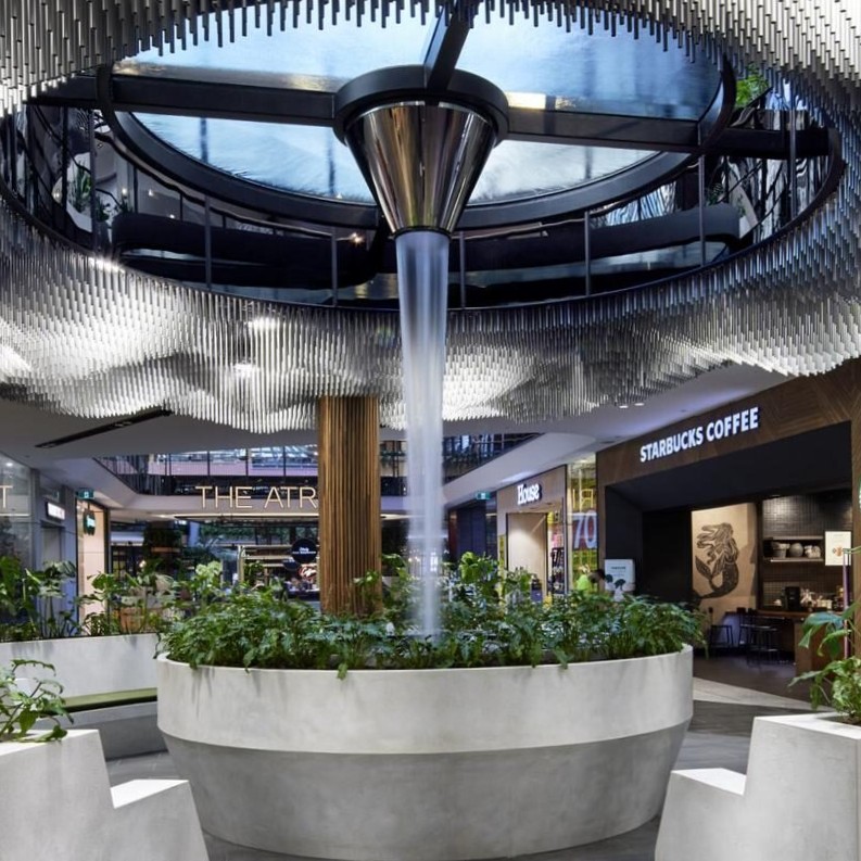 Highpoint shopping centre custom LICOM76 & Stainless steelBespoke Indoor water feature with integrated seating and planters by H2O Designs, Melbourne